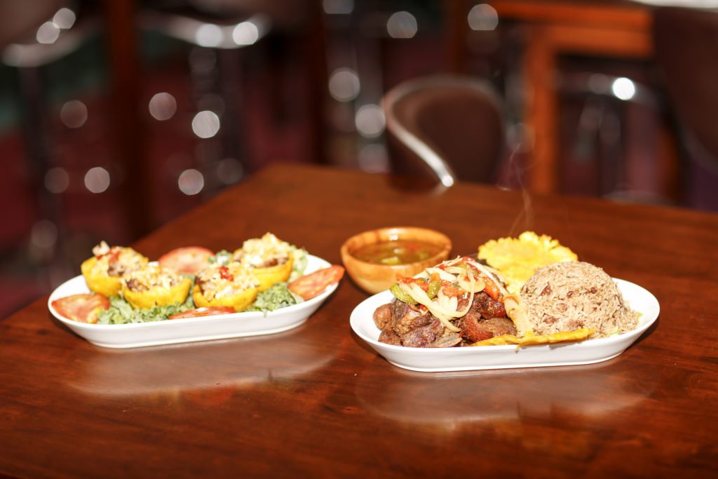 Sak Pase bowls, griot and diri kole - Photo by David Muir